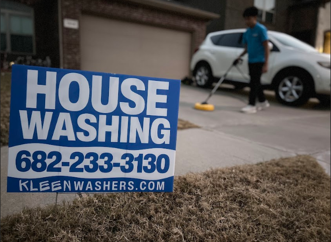 Professional pressure washing service in action